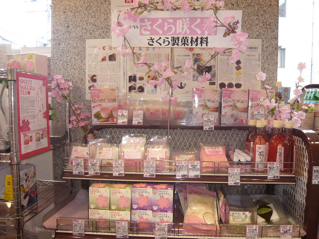 p1020237.jpg - This display of seasonal sakura goods is at Meiji-Ya, a foreign food shop we often visited in Sanjo.